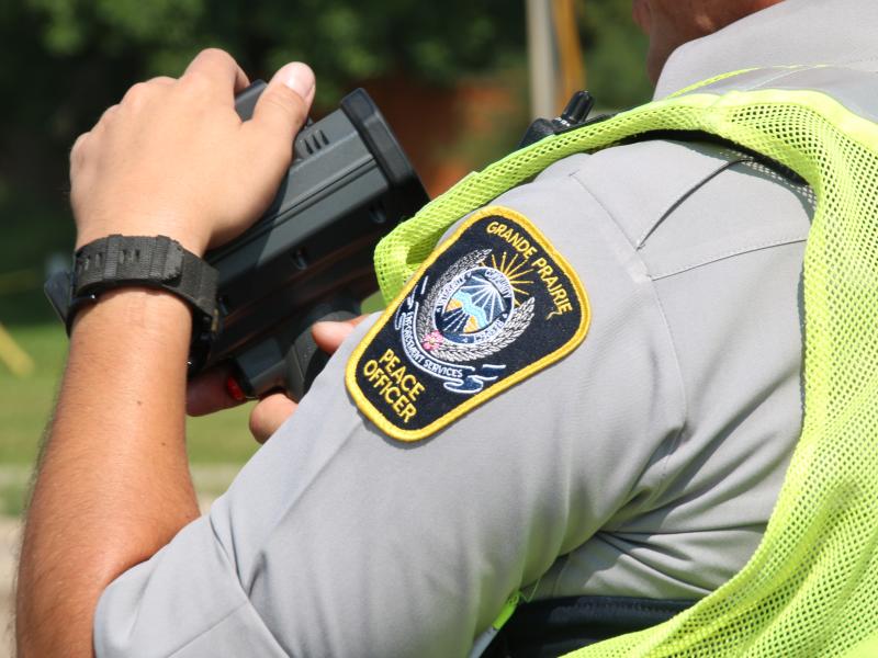 A Peace Officer holding speed Lidar