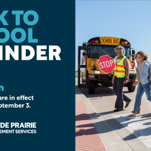 A poster reminding drivers about school zones